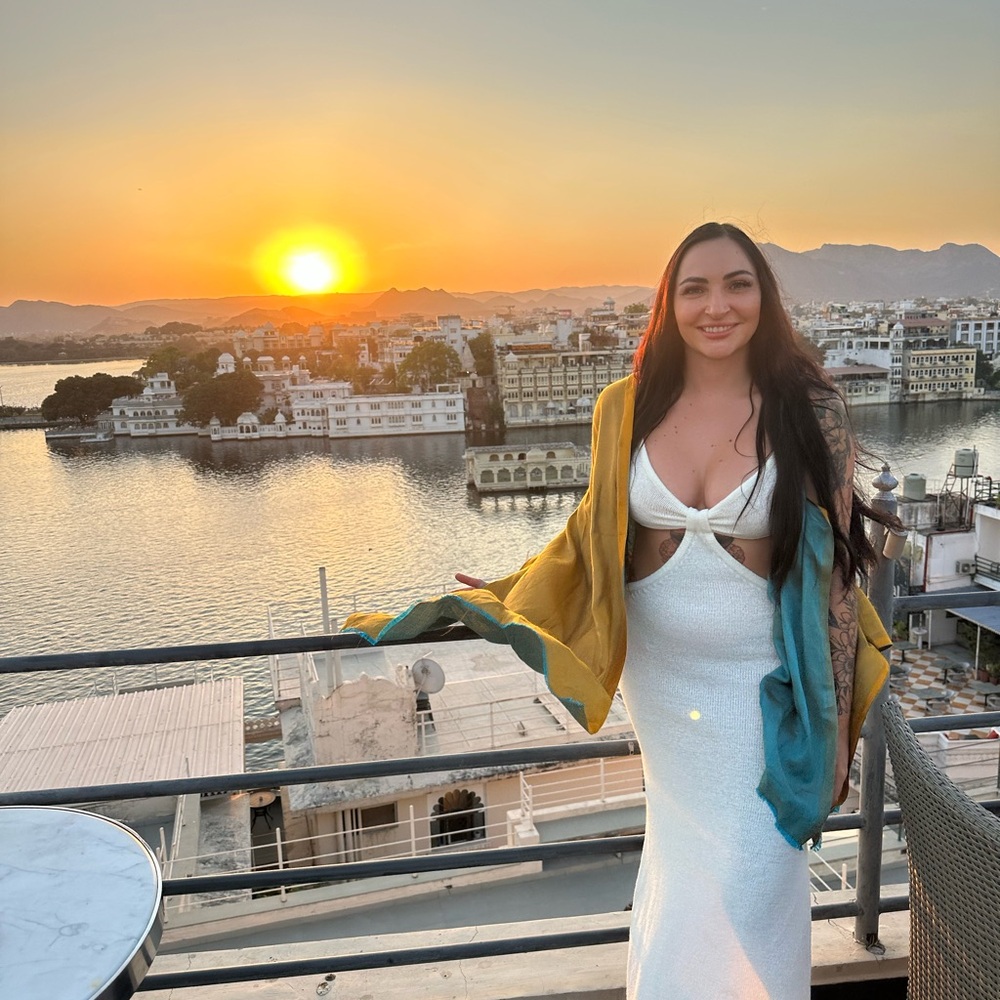 Elegant White Dress with Colorful Shawl